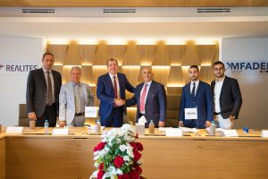 Signature partenariat REALITES AFRIQUE GROUPE MFADEL 1